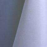 Periwinkle blue polyester tablecloth, runner, sash, and dinner napkin.