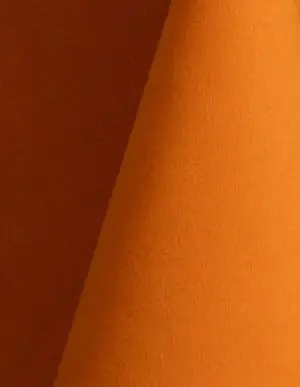 Orange cotton tablecloth and dinner napkin.
