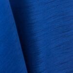 Royal blue majestic dupioni tablecloth, runner, sash, and dinner napkin.