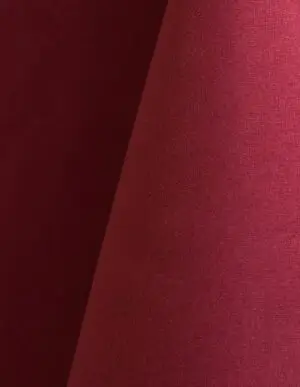Ruby red polyester tablecloth, runner, sash, and dinner napkin.