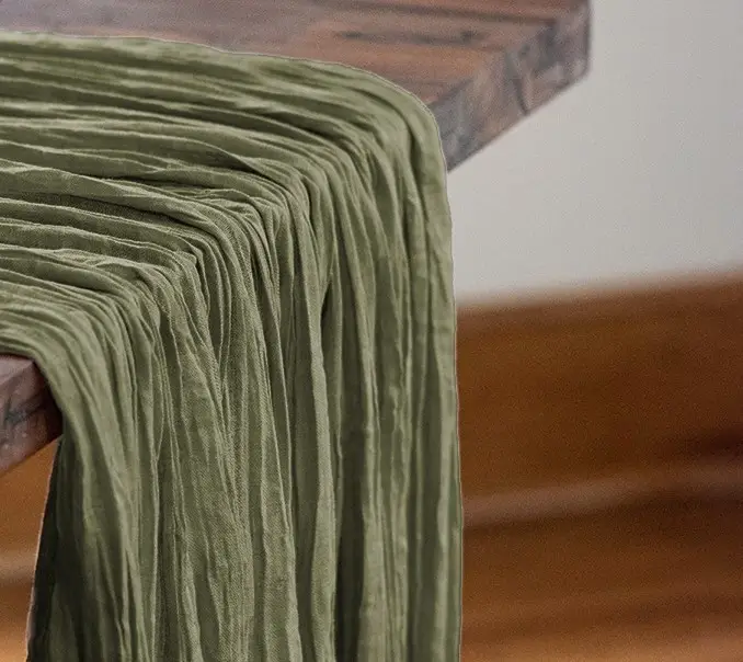 Sage green bohemian gauzy runner.