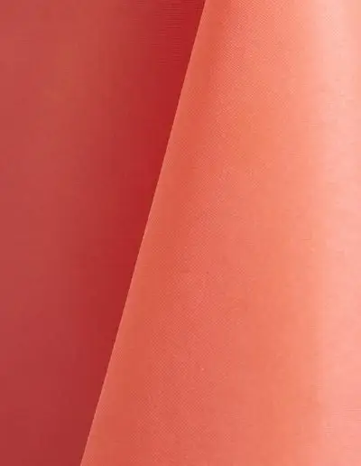 Salmon pink polyester tablecloth, runner, sash, and dinner napkin.