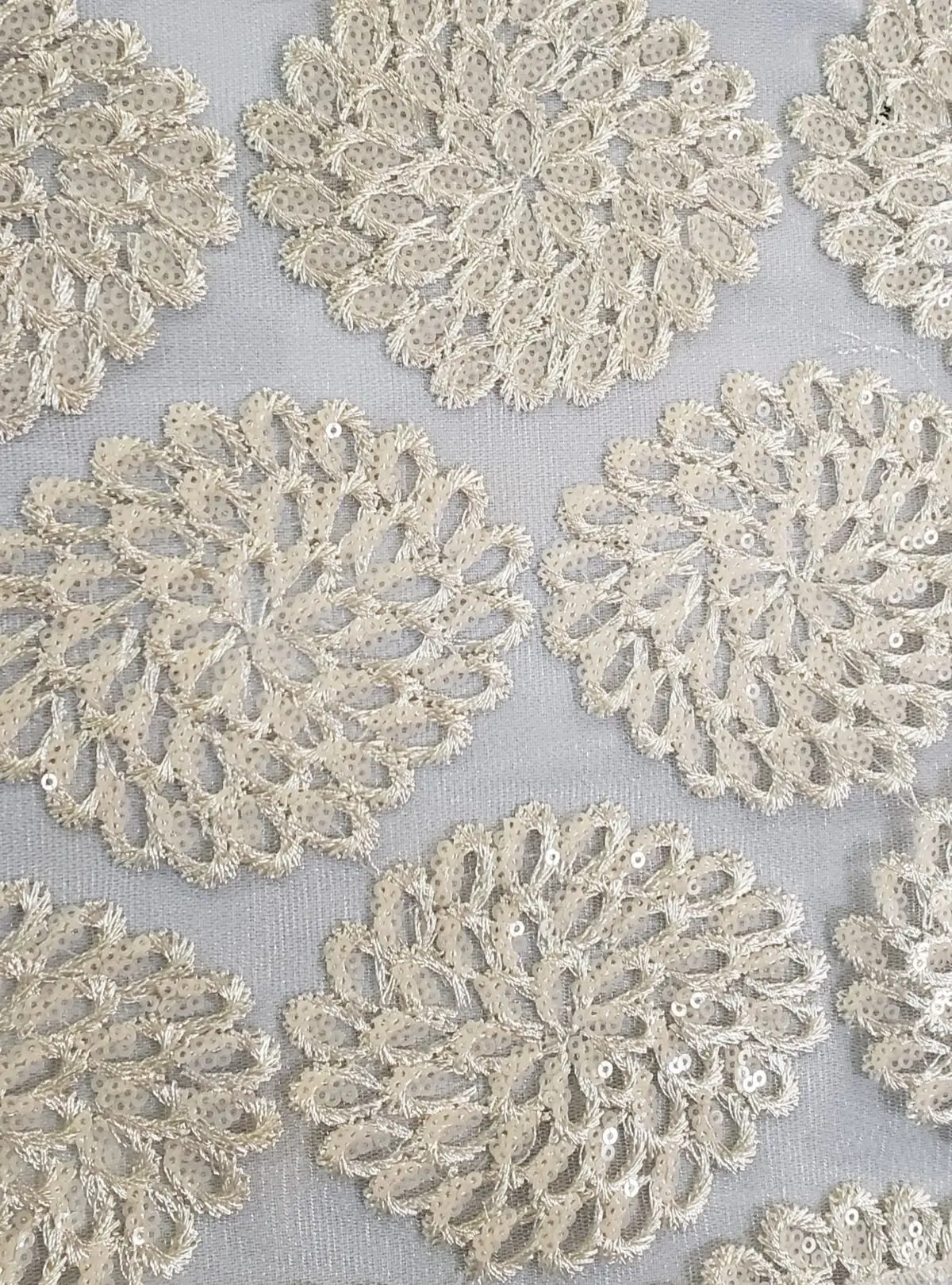 Sheer ivory floral print sequin tablecloth and runner.