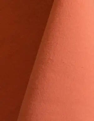 Pale orange cotton tablecloth and dinner napkin.
