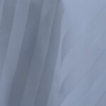 Silver grey satin stripe tablecloth.