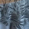 Silver and charcoal grey sequin abstract sheer tablecloth.