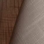 Warm grey textured dinner napkin.