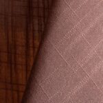 Mauve pink textured dinner napkin.