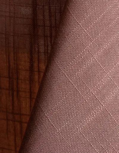 Mauve pink textured dinner napkin.