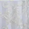 Ivory dimensional paisley lace tablecloth.