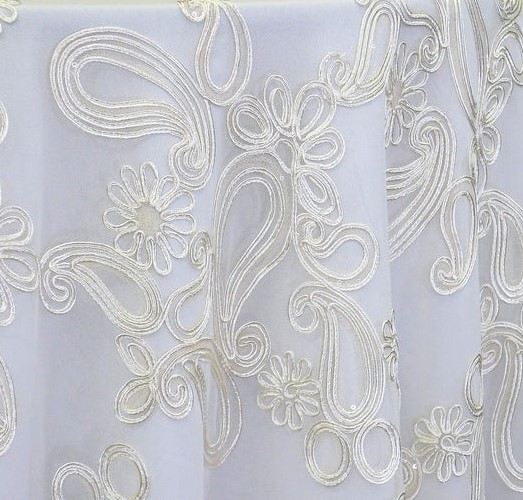 Ivory dimensional paisley lace tablecloth.