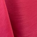 Watermelon pink majestic dupioni tablecloth, runner, sash, and dinner napkin.