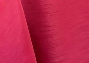 Watermelon pink majestic dupioni tablecloth, runner, sash, and dinner napkin.