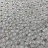 Dimensional sheer white floral print sequin tablecloth.