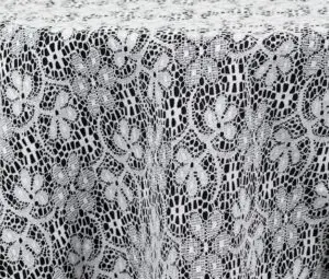 Traditional white lace tablecloth and runner.