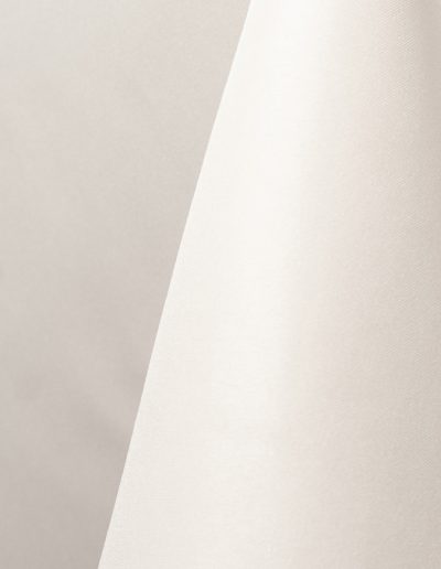 White polyester tablecloth, runner, sash, and dinner napkin.