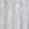 White dimensional floral print tablecloth.