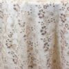 Sheer ivory, silver, and rose sequin floral print tablecloth.