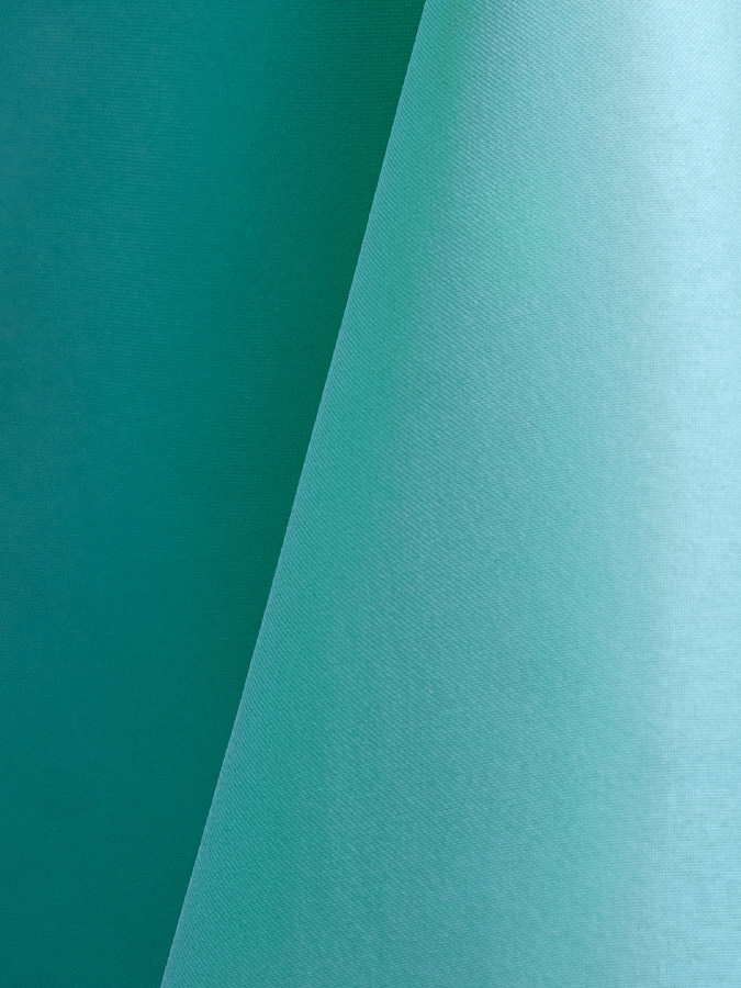 Turquoise blue polyester tablecloth, runner, sash, and dinner napkin.