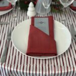 Crimson Ribbon over White Satin with Rouge Napkins